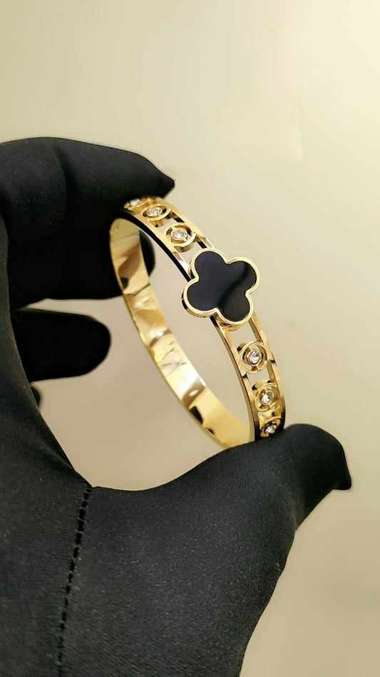 Luxury Gold Bangle with Embedded Gemstones
