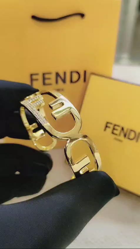 Elegant Fendi-Inspired Gold Jewelry Set – Bracelet & Earrings